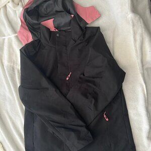 New Black rain jacket with pink trim by Sela